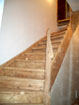 Das fertiggestellte Haus Steinbock, Die originale Treppe zwischen Erd- und Obergeschoss wird abgeschliffen.