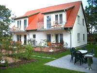 Baltic Sea Holiday Apartments Koelpinsee on the island Usedom. Yard and barbecue.
